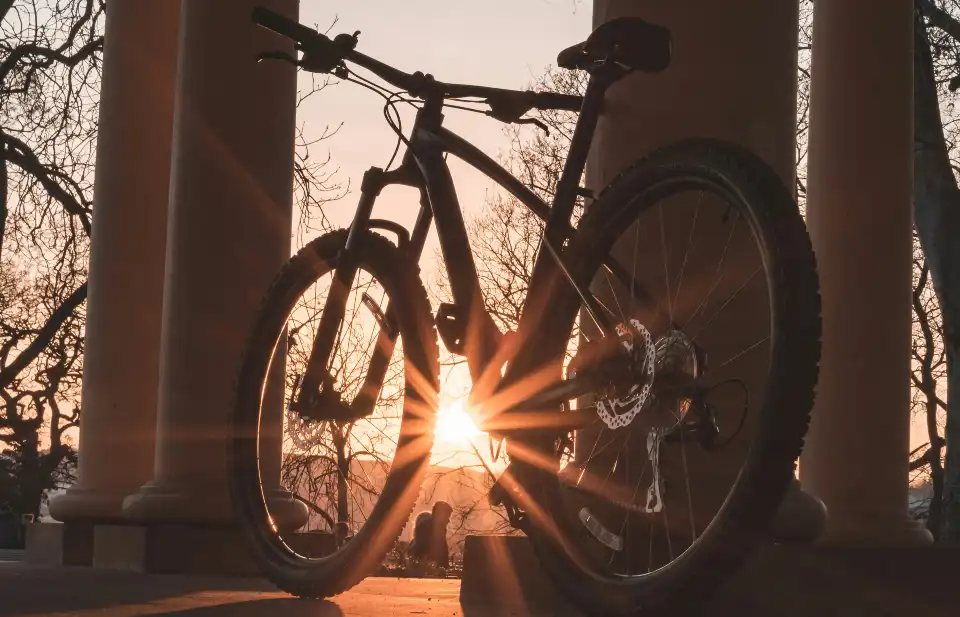 Mountain bike in front of the sunset